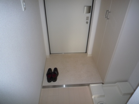 Entrance. With a shoe box