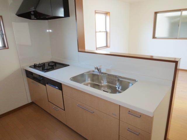 Kitchen. It is with dish washing dryer.