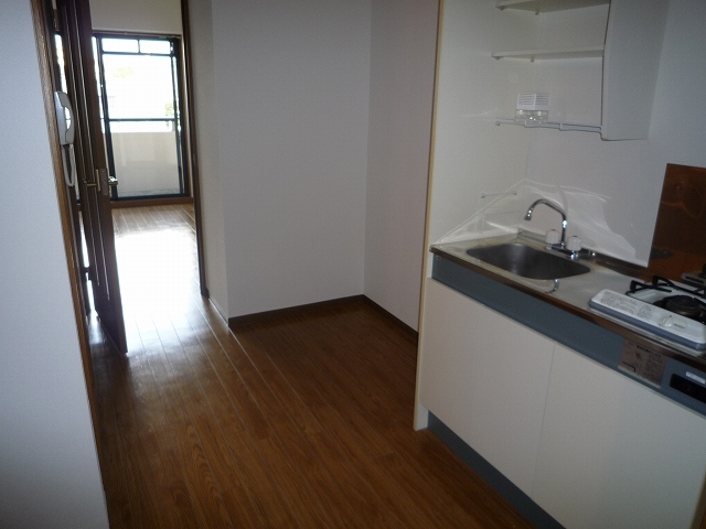 Kitchen. You can put a refrigerator in a wide space