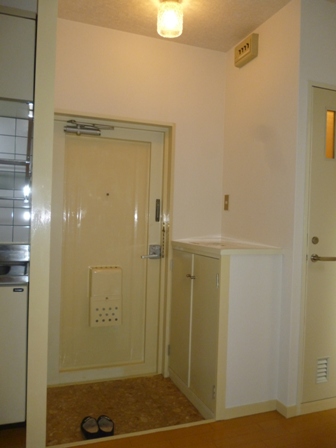 Entrance. With a shoe box