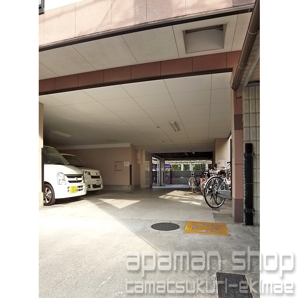 Parking lot. There are bicycle parking spaces