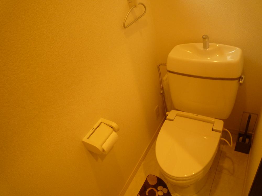 Toilet. 1F is a toilet. 