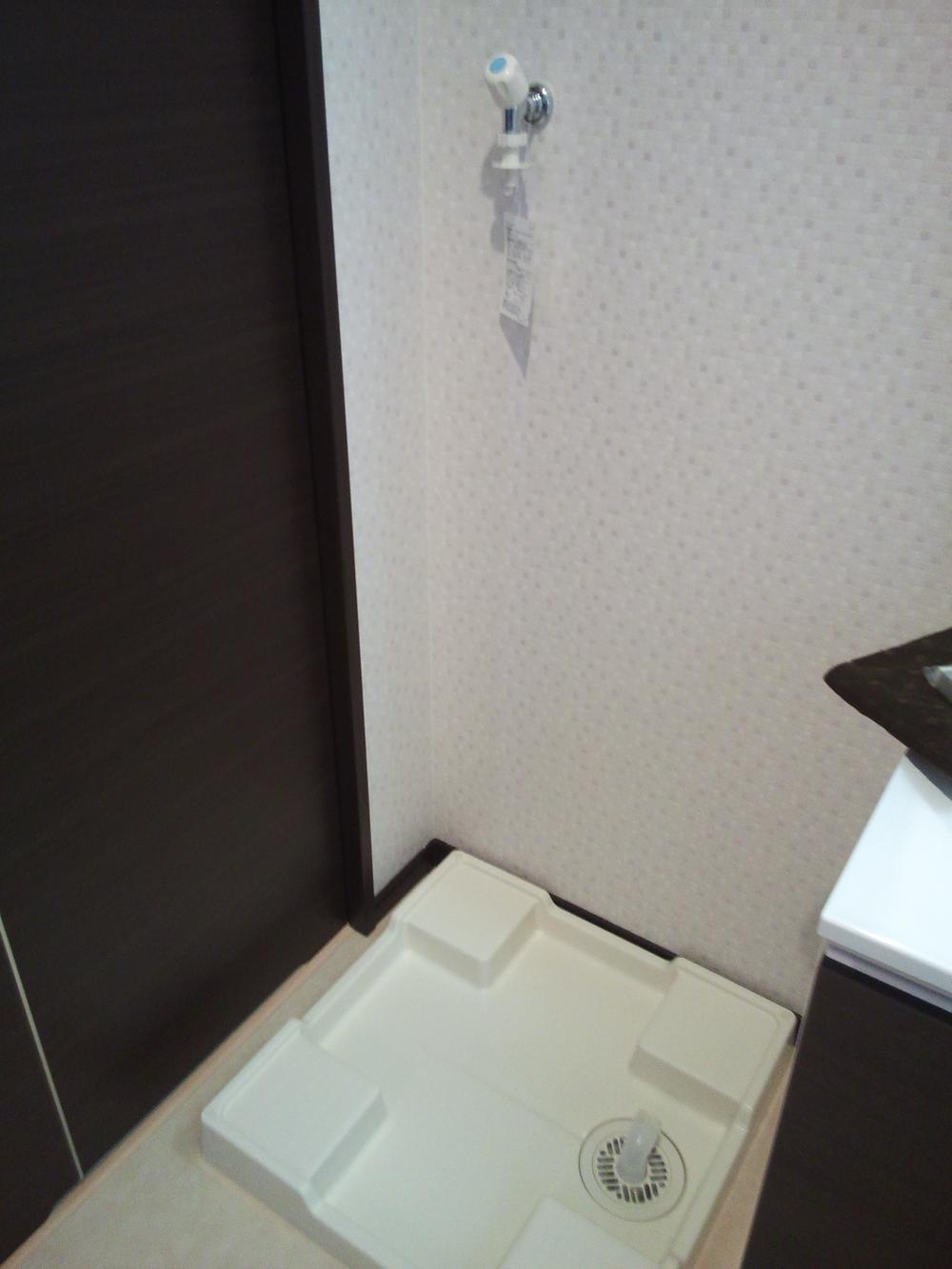 Wash basin, toilet. Washing machine Storage