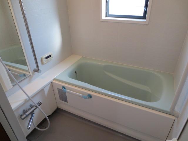 Bathroom. Bathroom with a window is spacious size
