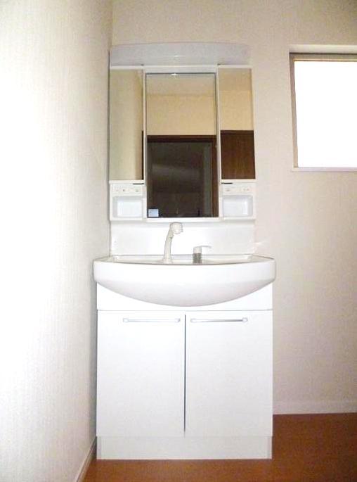 Wash basin, toilet. Washroom with a clean