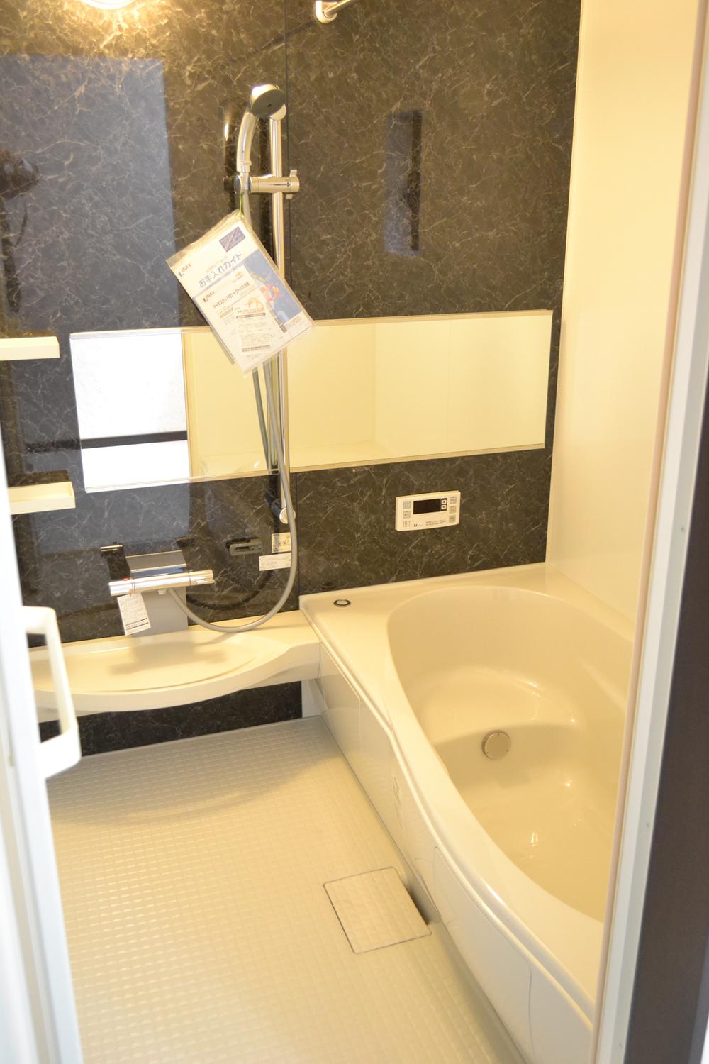 Model house photo. Bathroom