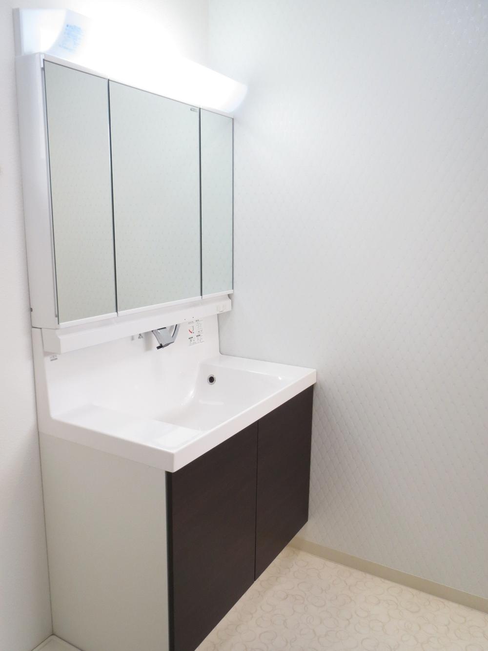 Wash basin, toilet. Bathroom vanity