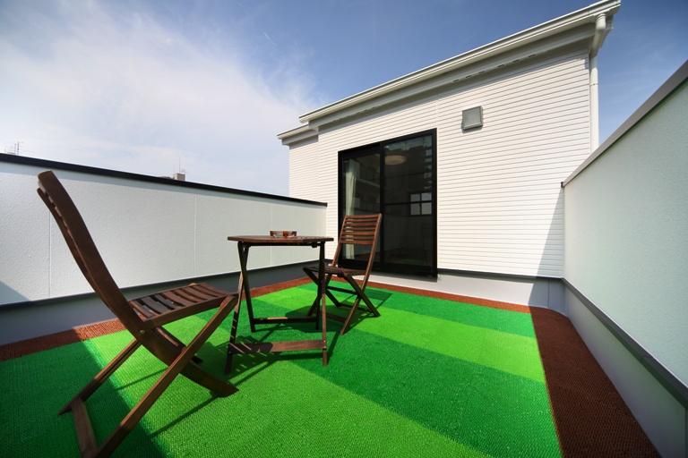 Balcony. Model house roof balcony