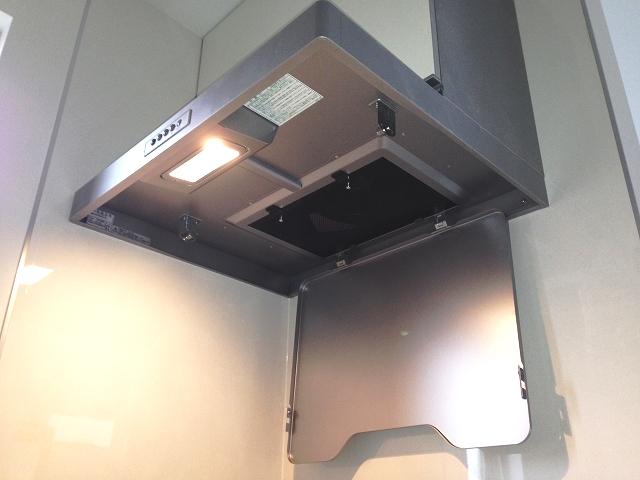 Kitchen. Adopt a range hood of your easy-care design