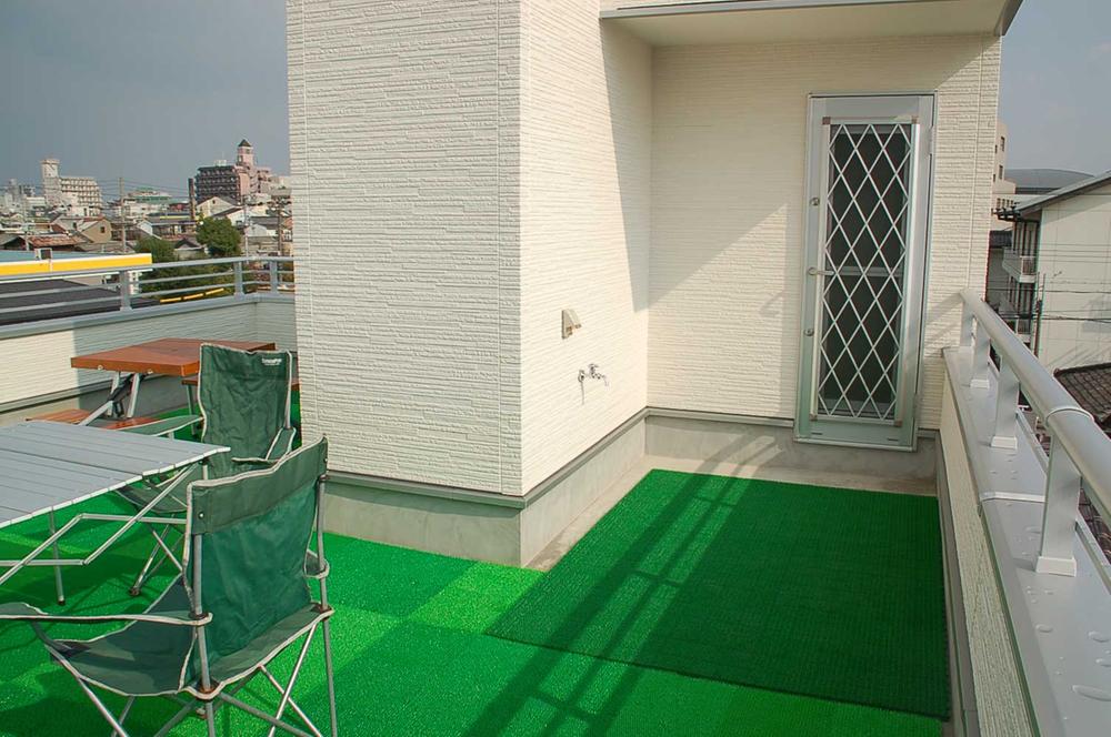 Balcony. Of course, water is also on the roof balcony, Also installed waterproof outlet!