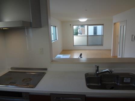 Kitchen. Living visible from the kitchen. Would you put the kind of reception set?