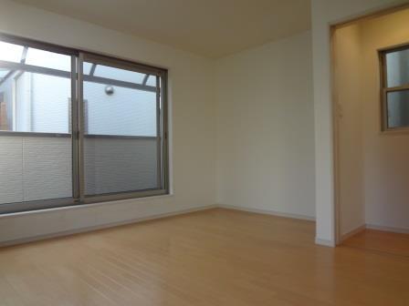 Living. Will you line up a nice table and chairs and the TV is here. 