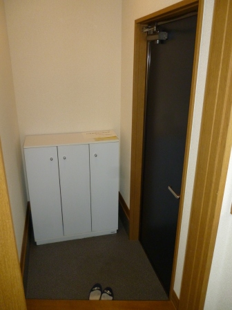 Entrance. With a shoe box