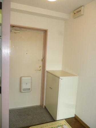 Entrance. With a shoe box