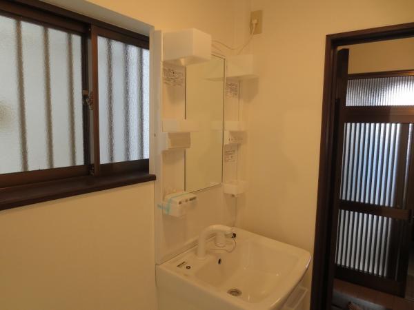 Wash basin, toilet. First floor basin space. The left side will be the washing machine space