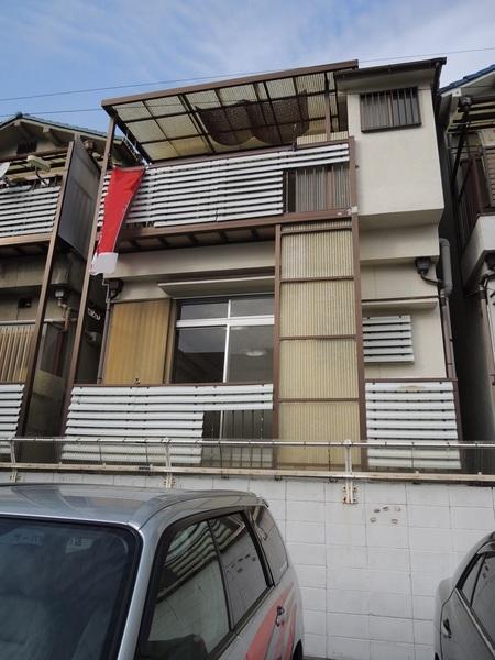 Other. From the back (south side). Clean on the server of the parking lot. 