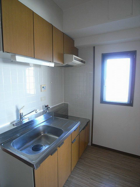 Kitchen. I do not even care about the smell of cooking in with a small window next to the large kitchen. 