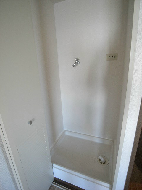 Other. In a room washing machine storage with a door, It hides the life outlook. 