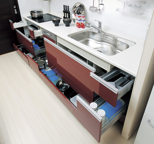 Kitchen.  ["Sliding housing" large capacity by effectively utilizing the dead space] Storage of system kitchens, It can be effectively utilized in the prone cabinet in a dead space, Adopt a sliding storage. Since the large cookware such as a pressure cooker or wok can also be accommodated, Except the width of the cuisine It is also likely to spread (type part / Same specifications)