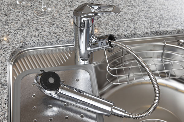 Kitchen.  [Water purifier integrated shower faucet] Shower head is pulled out, Convenient faucet for cleaning in the sink. It is with water purification function ※ Exchange of water purification cartridge is paid (same specifications)