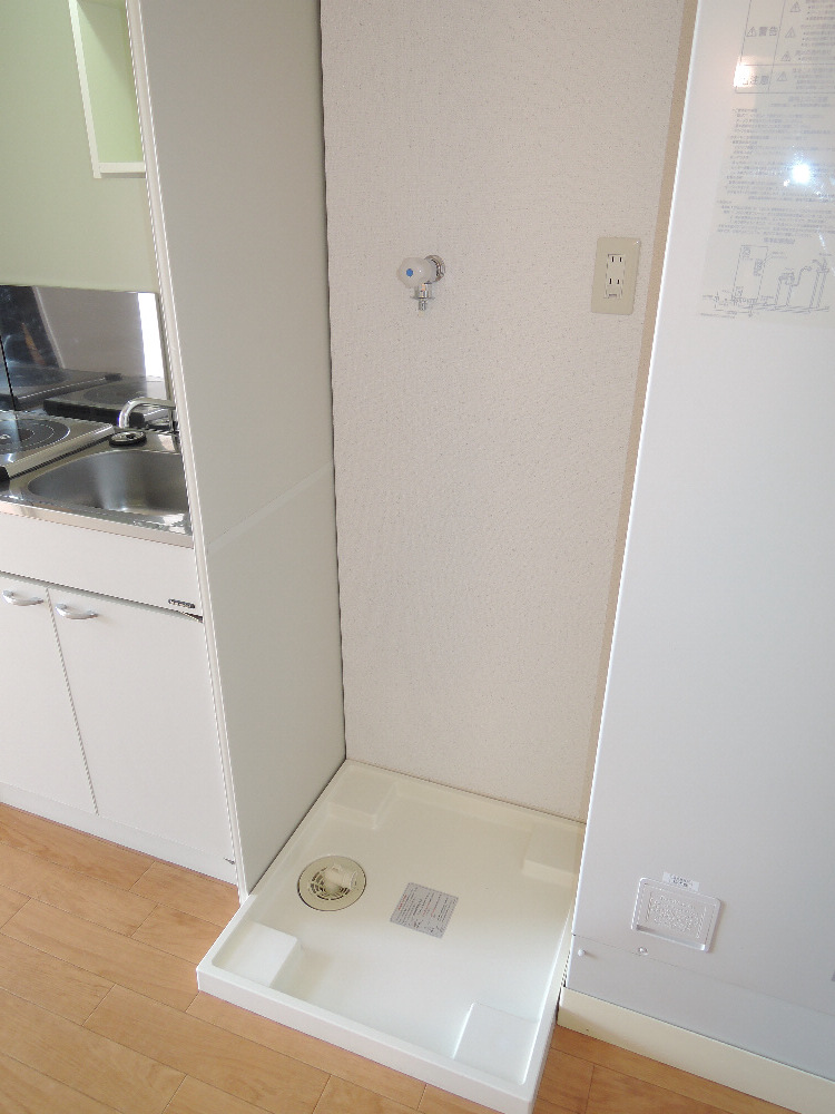 Other Equipment. Washing machine in the room