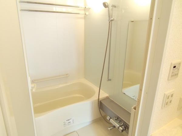 Bathroom. It is a bath with a bathroom drying heater