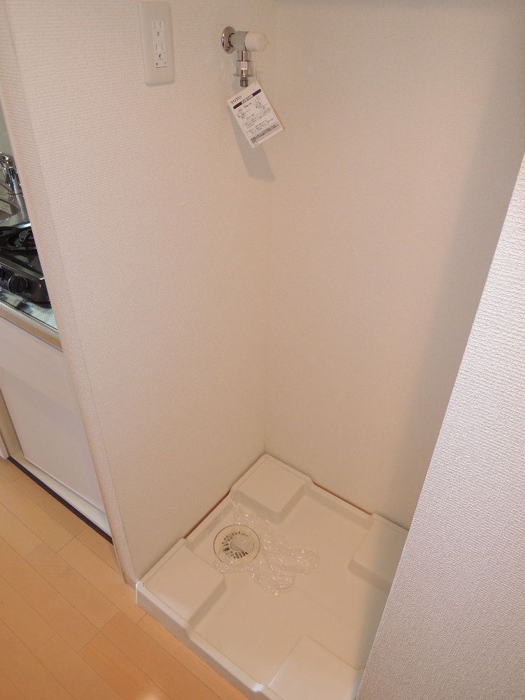 Other Equipment. Washing machine in the room