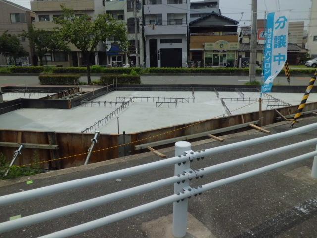 Local photos, including front road. A No. land Foundation work