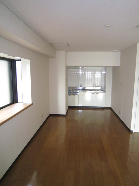 Living and room. Good day in with a bay window. 