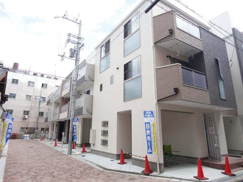 Local appearance photo. Subdivision of the road has adopted an inter-locking produce a quiet residential area