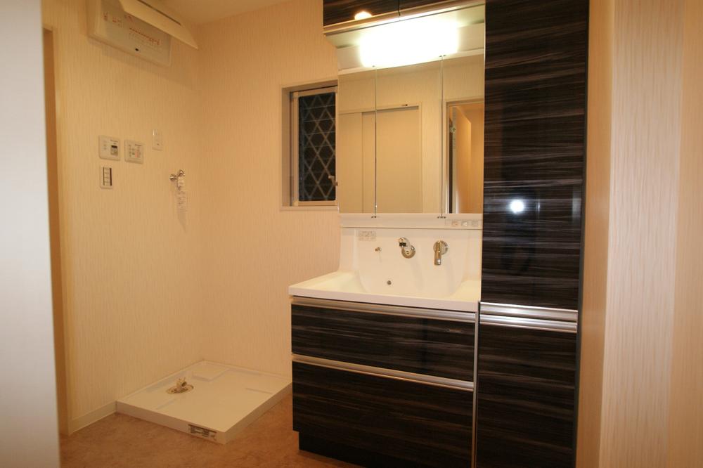 Wash basin, toilet. In storage lot, It is refreshing washroom.