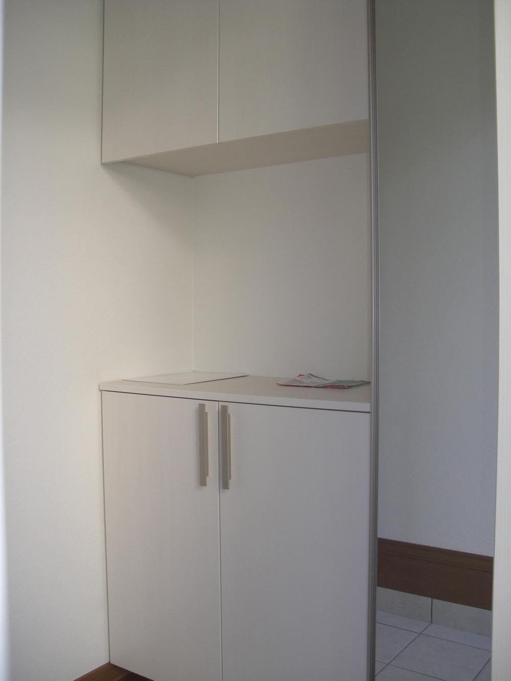 Entrance. Large shoe box