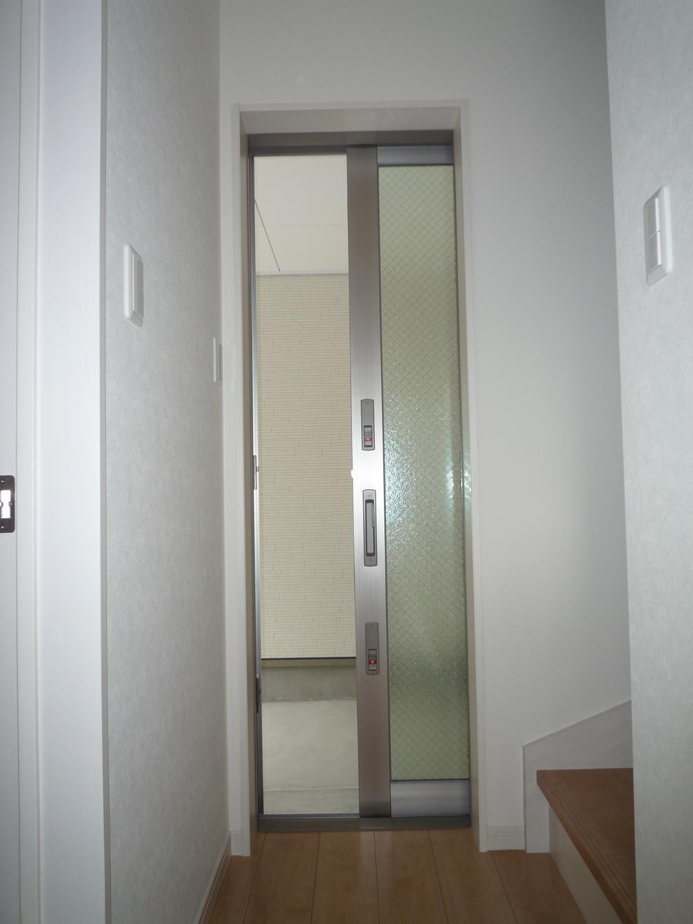 Other. Back door from the parking lot