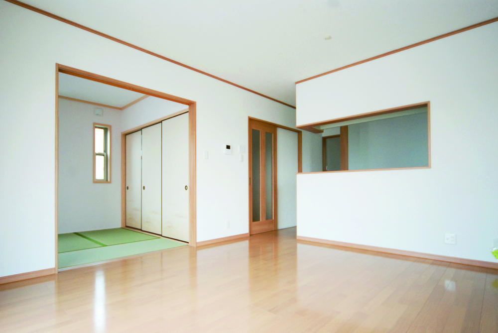 Living. It attracts nature and family smile at the spacious living room.