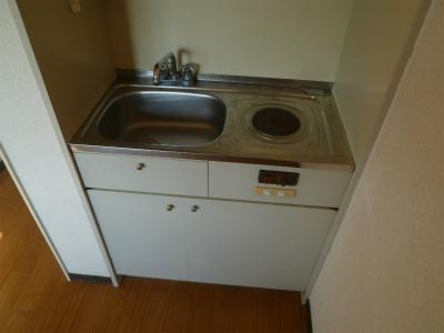 Kitchen. It is a compact kitchen. 