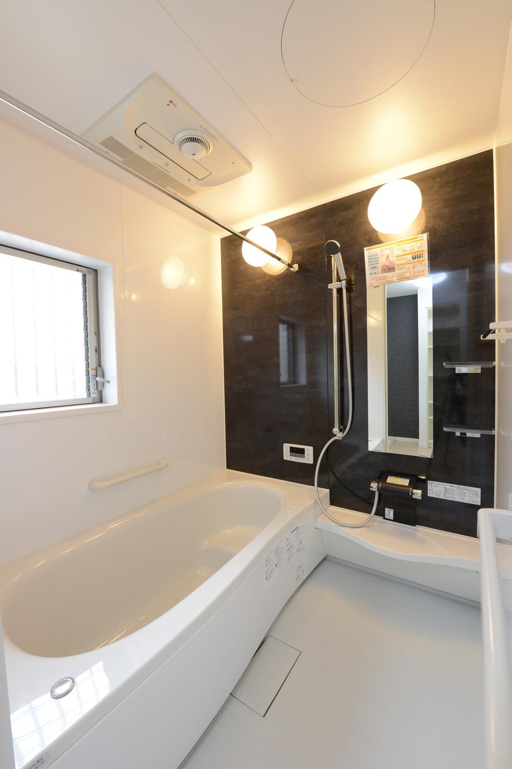 Bathroom. Hard artificial marble tub marked with dirt ・ floor ・ Care is Ease drainage port.