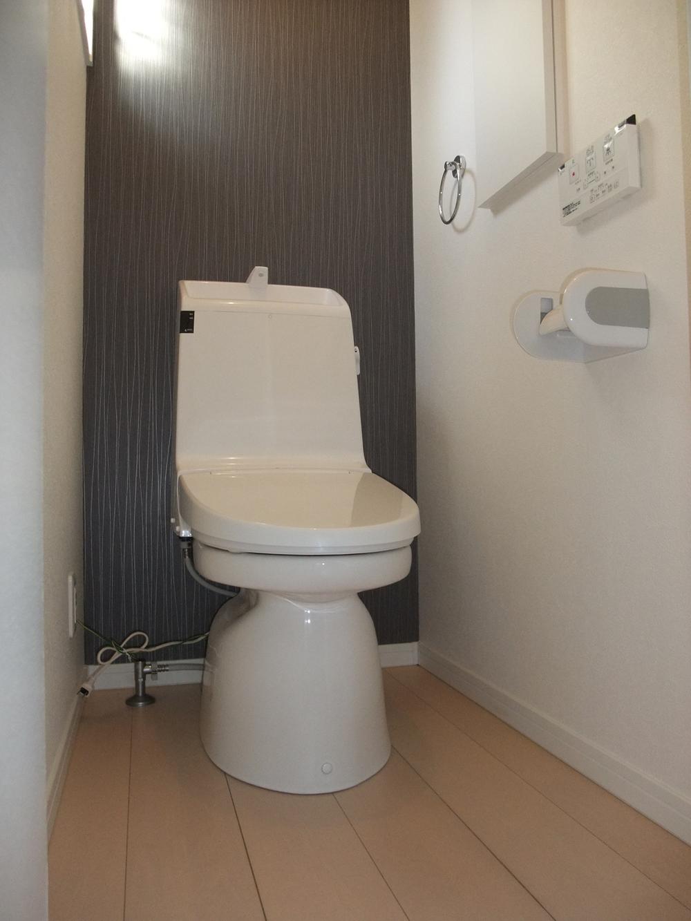 Toilet. Washlet is integral type of water-saving toilet bowl.