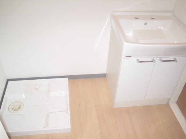 Washroom. It attaches mirror