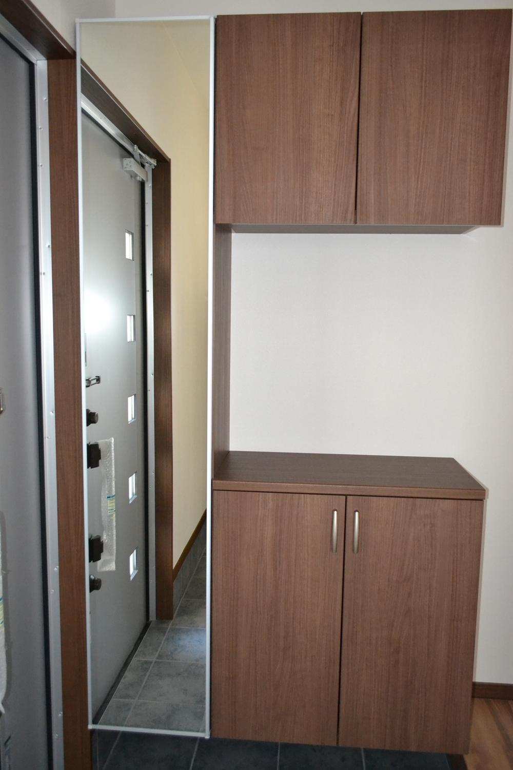 Model house photo. Entrance example