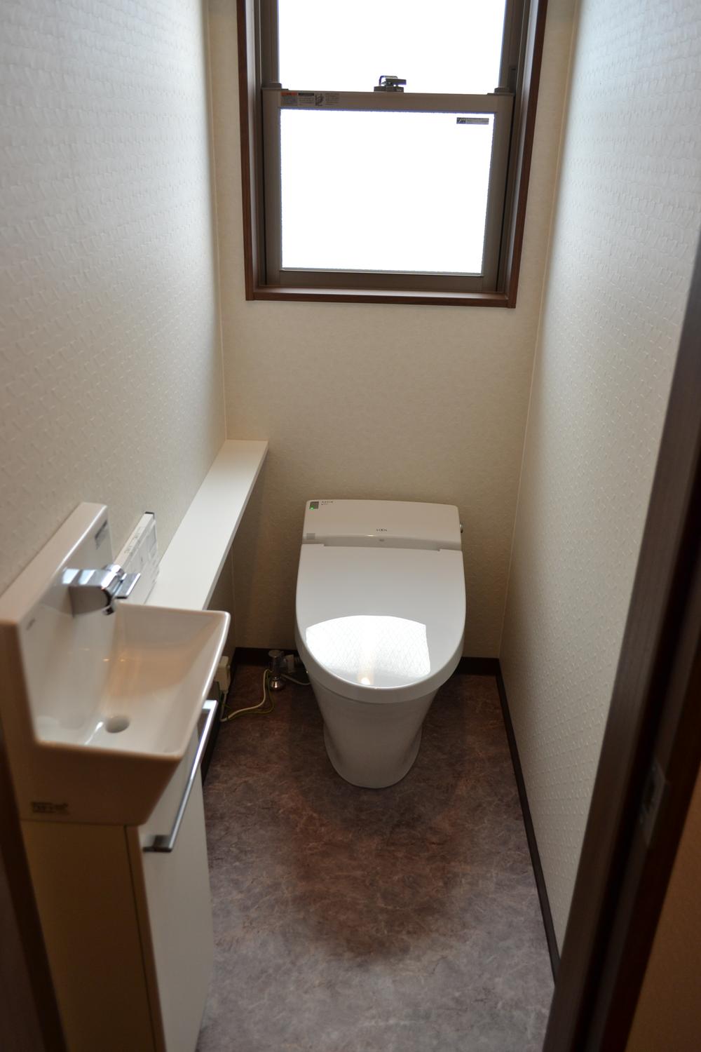 Model house photo. Toilet example