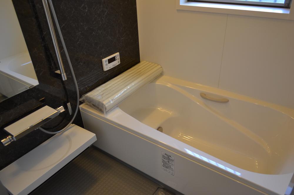 Model house photo. Bathroom example