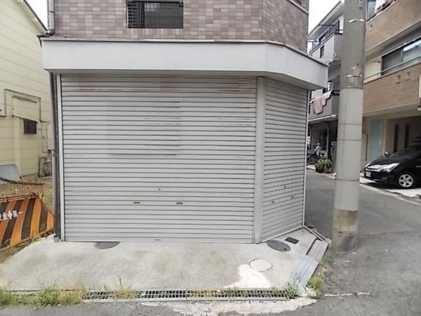 Parking lot. With shutter garage to protect the important car