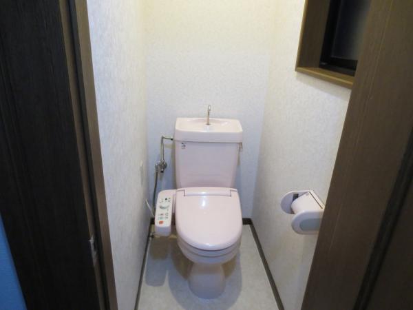 Toilet. Toilet is equipped with Washlet