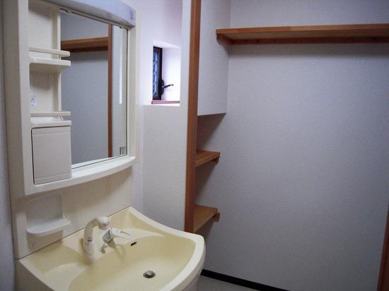 Wash basin, toilet. Wash