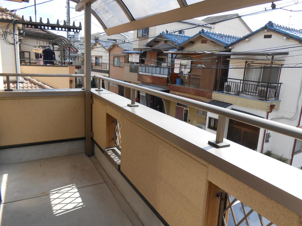 Balcony. South-facing for day is good! 