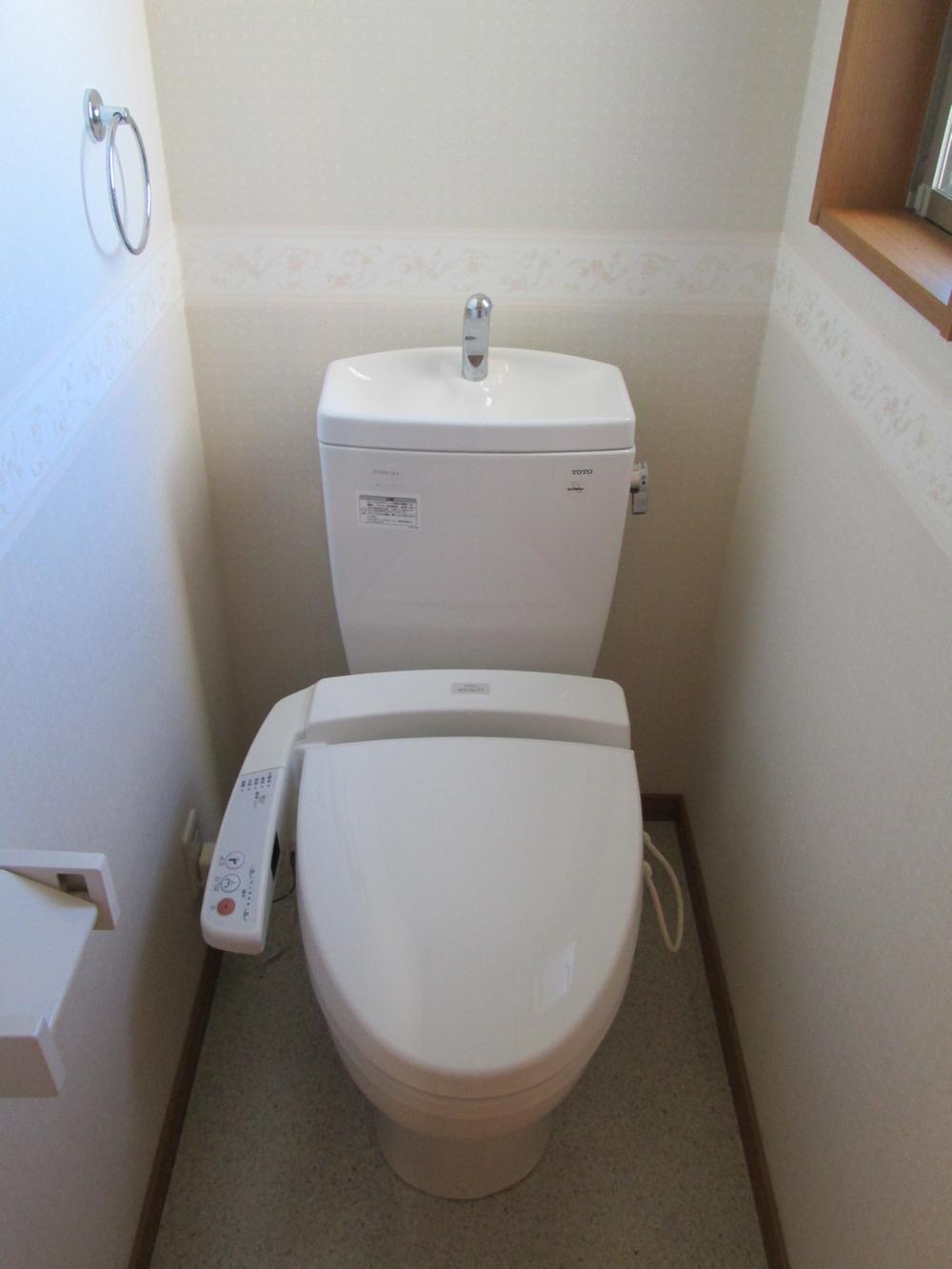 Toilet. Bright restroom. 