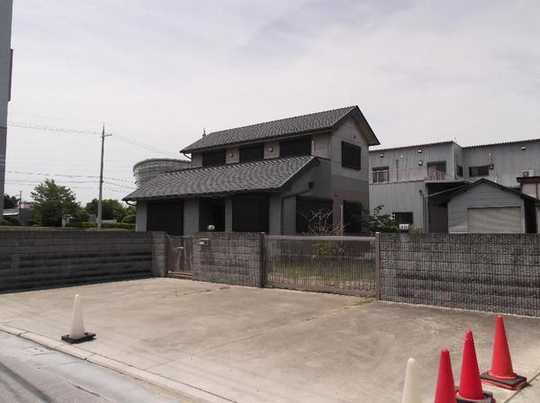 Local appearance photo. Building appearance and car space