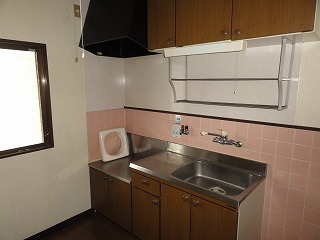 Kitchen. There is a window in the kitchen next to.