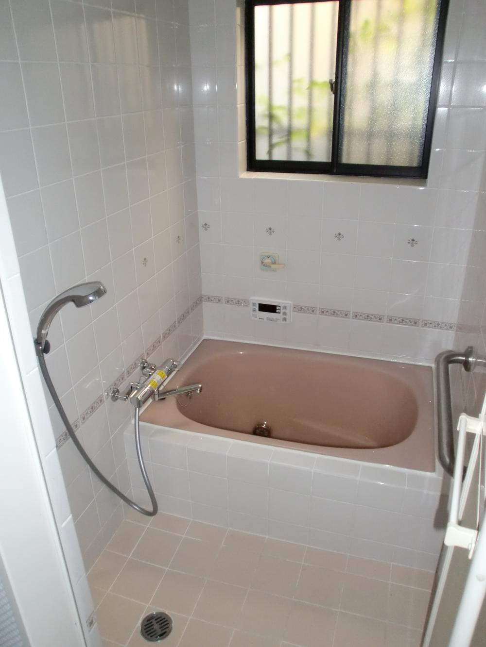 Bathroom. It is widely felt the bathroom there is a big window. 