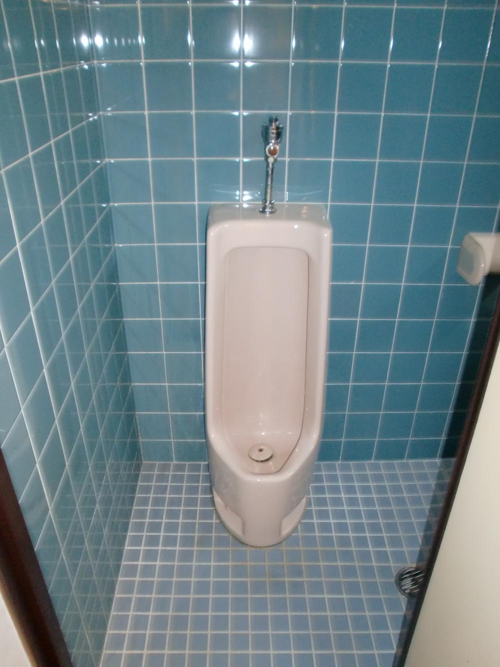 Toilet. Toilet is also attached for men